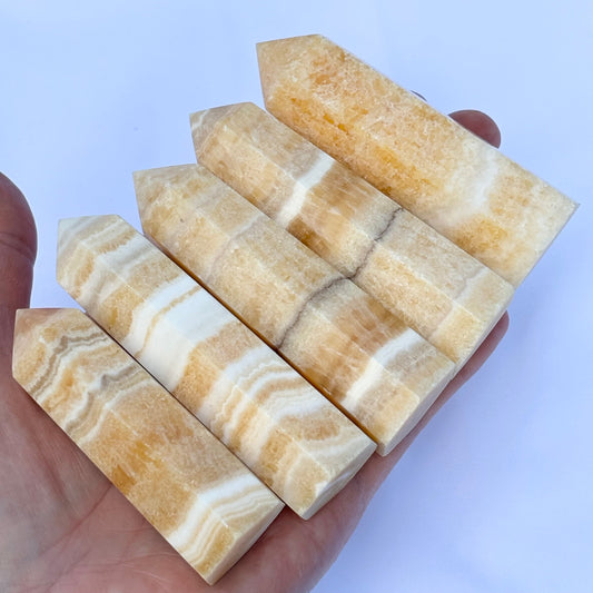 Banded Orange Calcite Point - Shiny Crystals